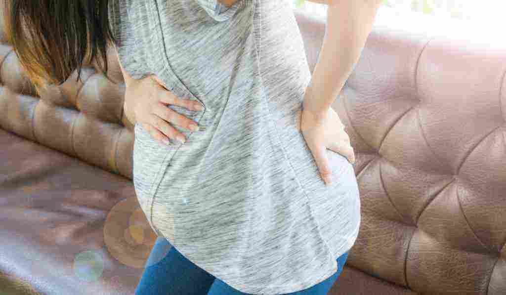 أسباب آلام الظهر عند الحامل في الشهور الأولى