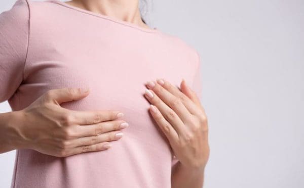 هل ألم الثدي بعد التبويض من علامات الحمل